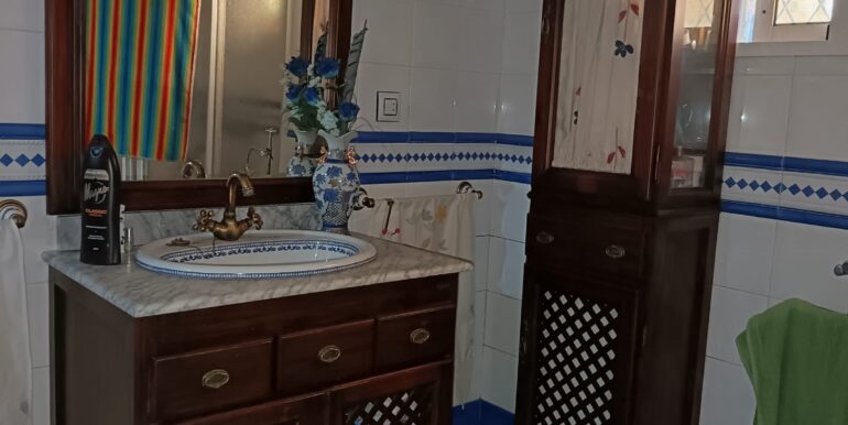 Baño dentro de dormitorio